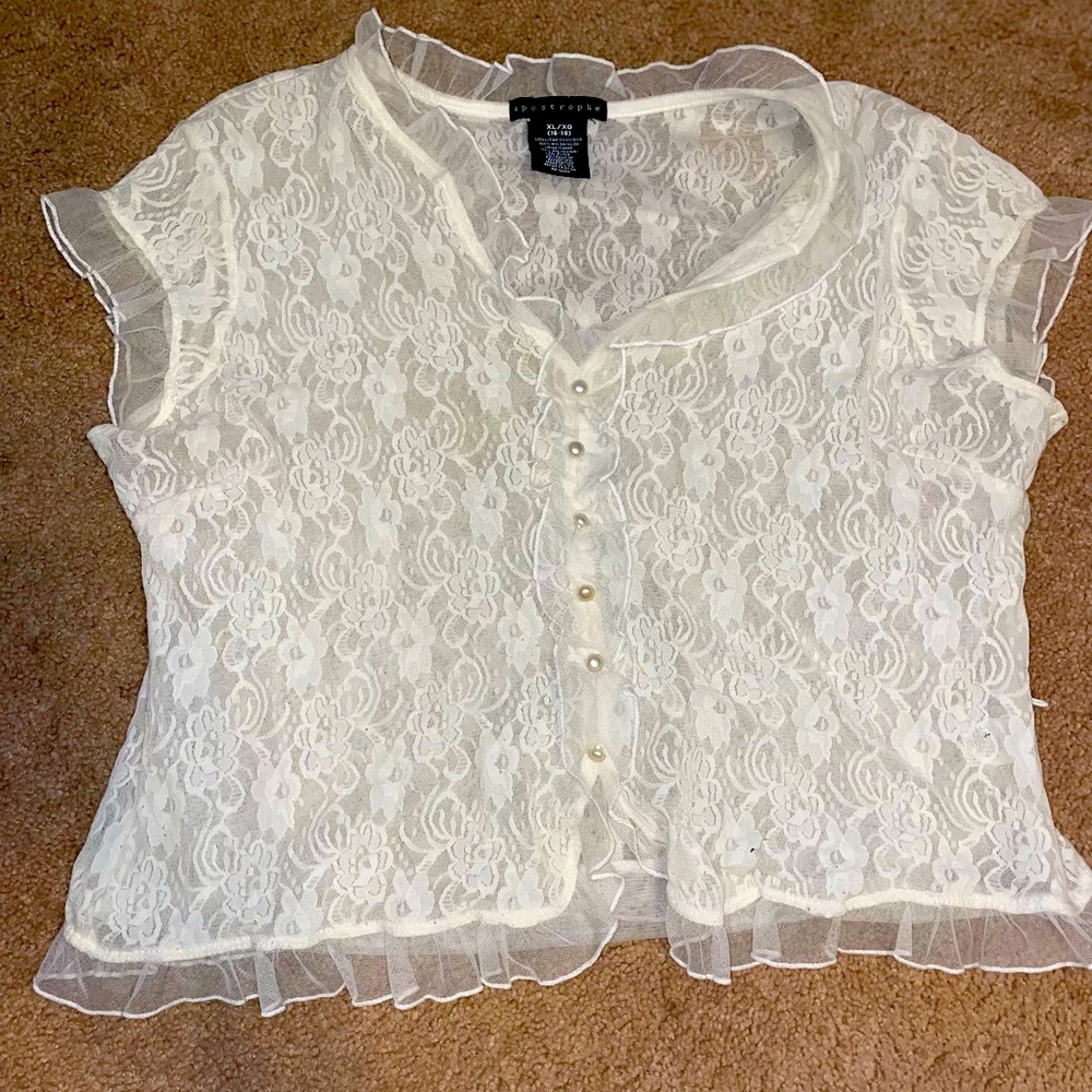 White lace blouse with pearl buttons